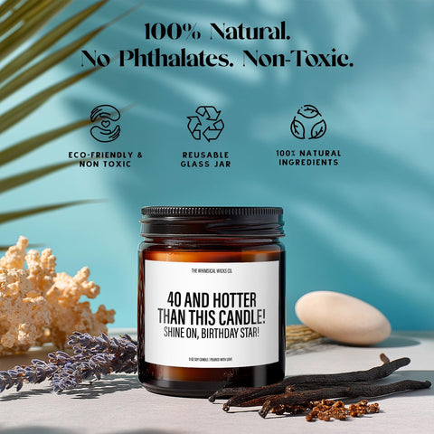 The “40 and Hotter Than This Candle!” candle shown with icons that highlight its clean-burning soy wax, non-toxic ingredients, and reusable amber jar.