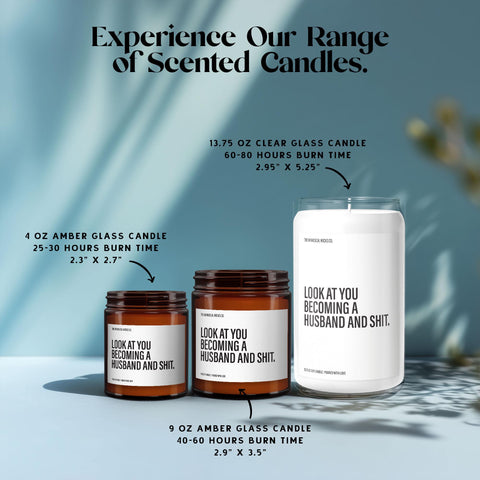 Amber 4oz and 9oz glass jar candles plus a 13.75oz clear glass jar candle, all labeled “Look at You Becoming a Husband and Shit,” shown together to highlight size options for customers wanting cheeky bachelor or groom candles.